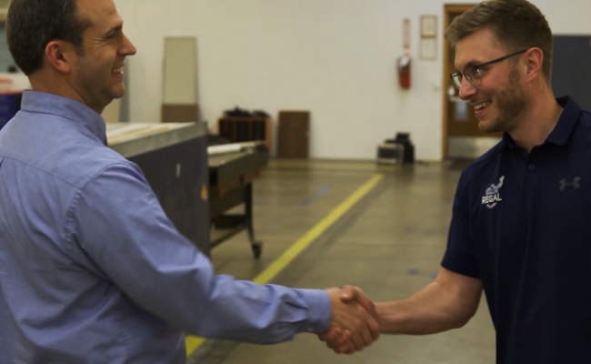 Michael shaking hands